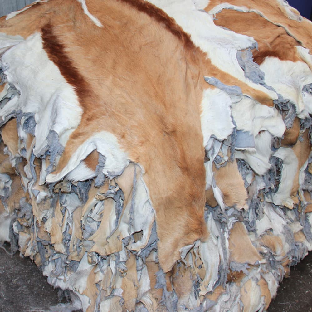 A fur garment on a rail after cleaning