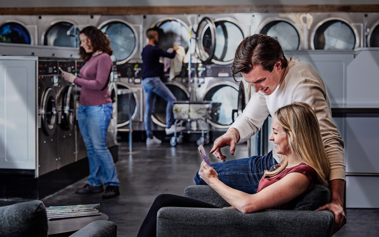 Speed Queen commercial washing machines in a laundry