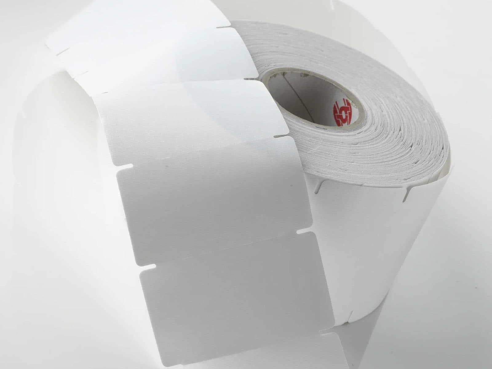 A roll of blank Thermopatch HiQ heat seal labels